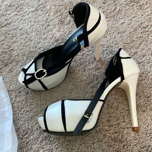 Black and white fancy heeled shoes